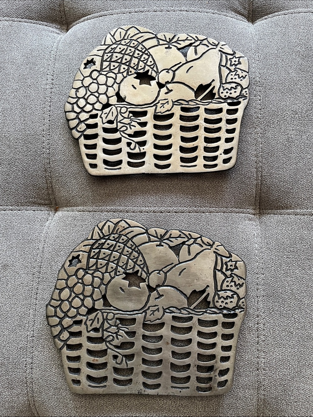Metal fruit basket trivets.